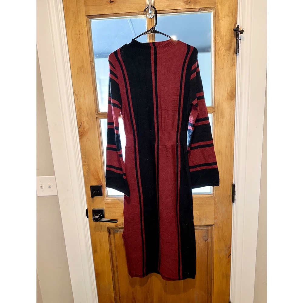 Small burgundy and black long sleeve sweater dress with side slit